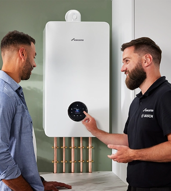 Worcester Bosch Accredited Installer Showing Boiler Settings To Customer